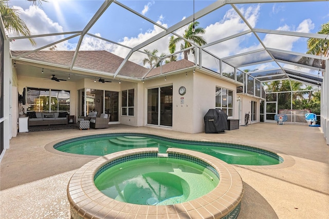 view of pool with an in ground hot tub, an outdoor living space, ceiling fan, grilling area, and a patio