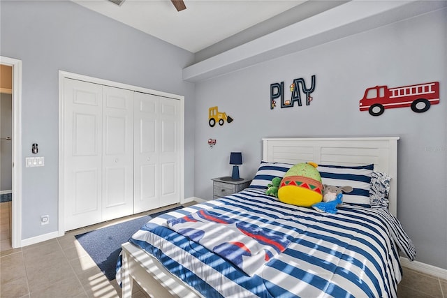 4531 Swordfish Dr, Bradenton, FL 34208 - bedroom with tile patterned flooring, a closet, baseboards, and ceiling fan