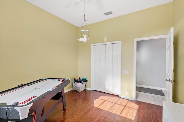 4531 Swordfish Dr, Bradenton, FL 34208 - rec room with wood finished floors, ceiling fan, and baseboards