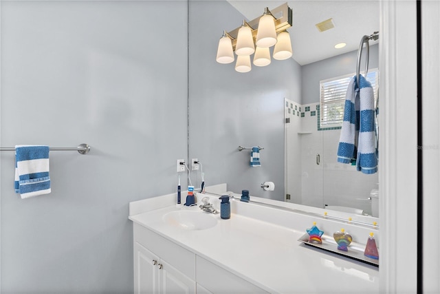 4531 Swordfish Dr, Bradenton, FL 34208 - bathroom with toilet, vanity, and a stall shower