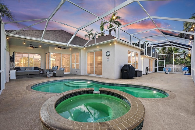 4531 Swordfish Dr, Bradenton, FL 34208 - pool at dusk featuring an outdoor living space, a patio, a pool with connected hot tub, and ceiling fan