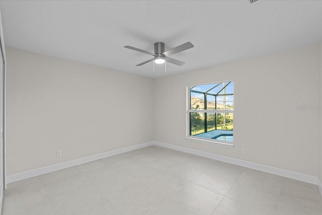 unfurnished room with ceiling fan