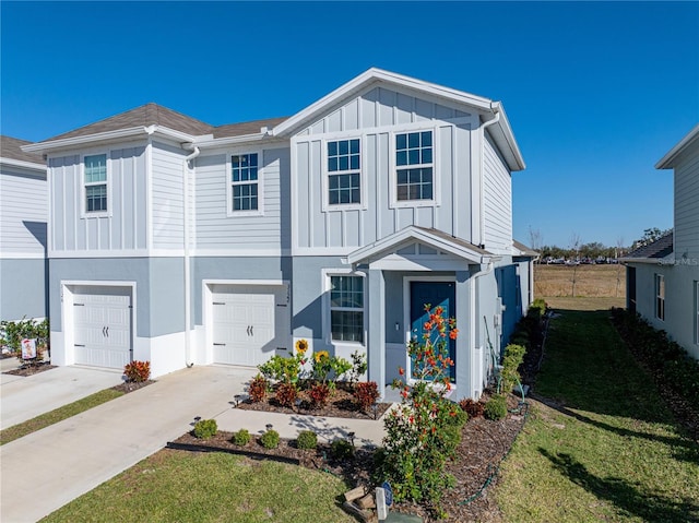 view of front facade featuring a garage and a front lawn