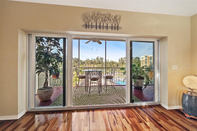 entryway with ceiling fan and hardwood / wood-style floors