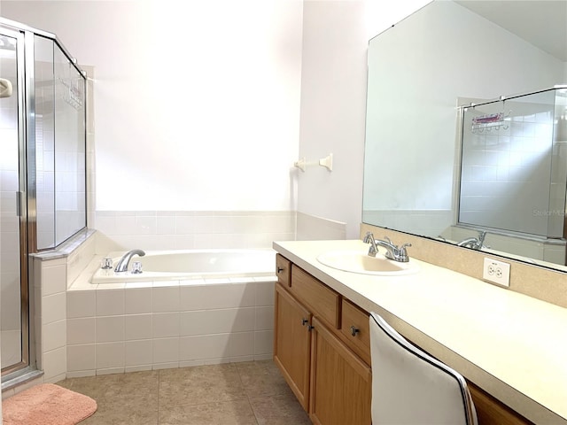 bathroom with tile patterned flooring, vanity, and independent shower and bath