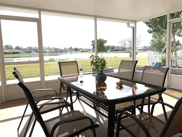 sunroom with a water view