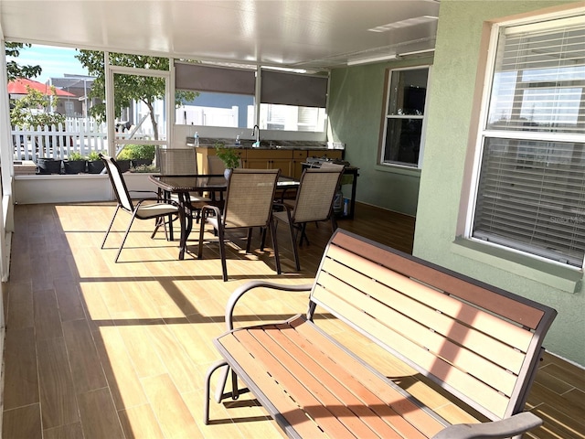 sunroom / solarium with sink