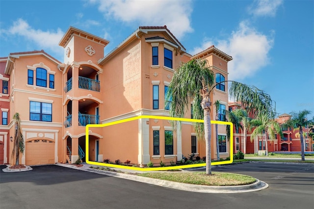 view of building exterior featuring a garage