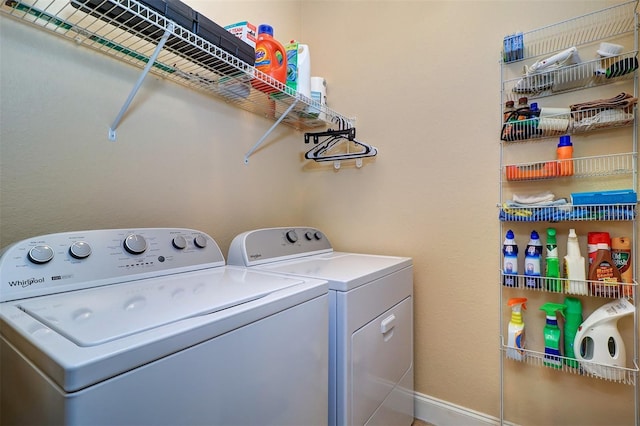 laundry room with separate washer and dryer