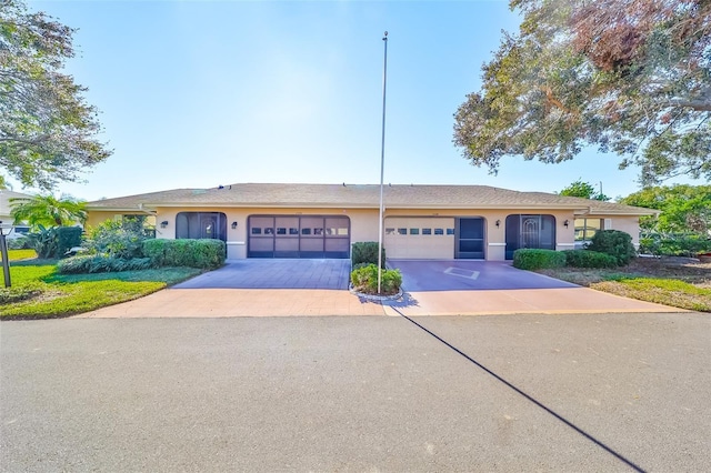 ranch-style home with a garage