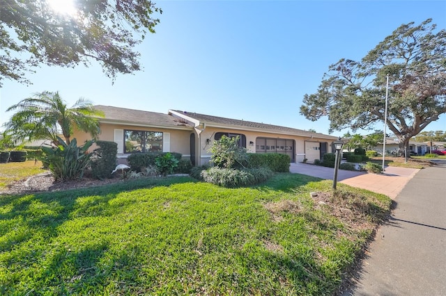 single story home with a front yard