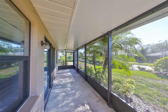 unfurnished sunroom featuring plenty of natural light