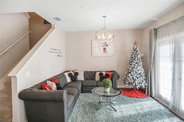 living room featuring a chandelier