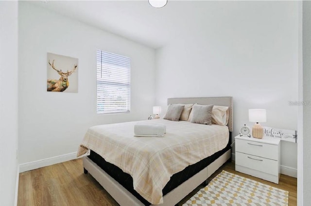 bedroom featuring light wood-type flooring