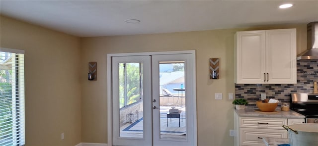 4514 Dewey Dr, New Port Richey, FL 34652 - entryway with french doors, baseboards, and recessed lighting