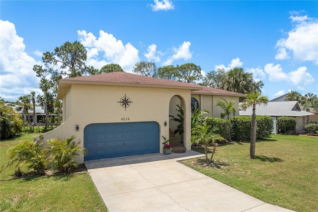 4514 Dewey Dr, New Port Richey, FL 34652 - mediterranean / spanish home featuring stucco siding, a front yard, driveway, and a garage