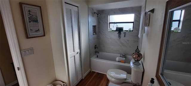 4514 Dewey Dr, New Port Richey, FL 34652 - full bath featuring a closet, toilet, plenty of natural light, and washtub / shower combination