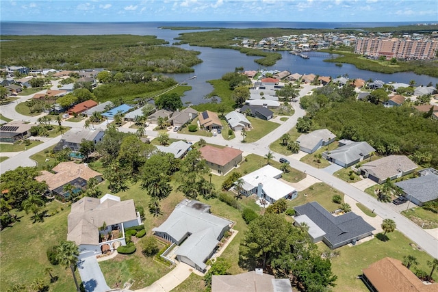 4514 Dewey Dr, New Port Richey, FL 34652 - aerial view of property and surrounding area featuring a nearby body of water and nearby suburban area