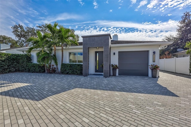 view of front of home with a garage