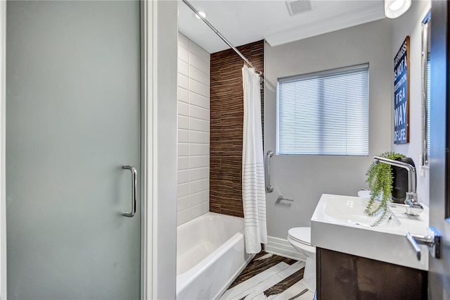 full bathroom with vanity, shower / bath combination with curtain, and toilet