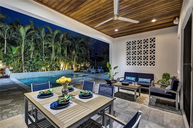 view of patio featuring an outdoor hangout area and ceiling fan