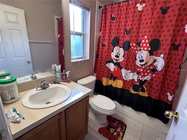 full bathroom with tile patterned floors, vanity, shower / bath combination with curtain, and toilet