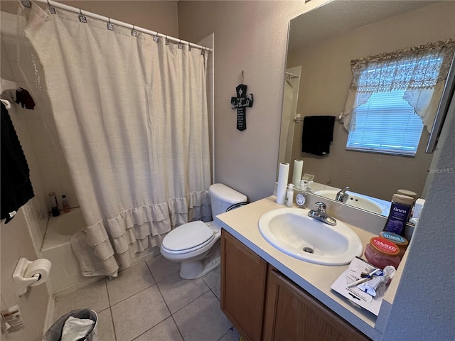 full bathroom with toilet, vanity, tile patterned floors, and shower / bath combo with shower curtain