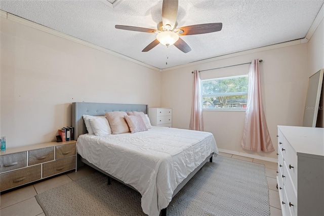 tiled bedroom with ceiling fan, crown molding, and a textured ceiling