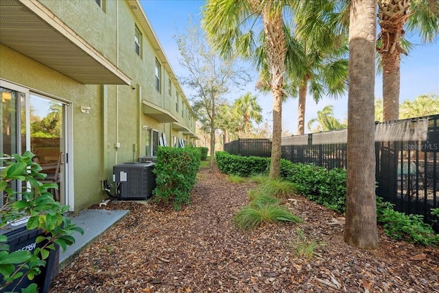 view of yard featuring central AC