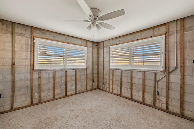 unfurnished room with ceiling fan