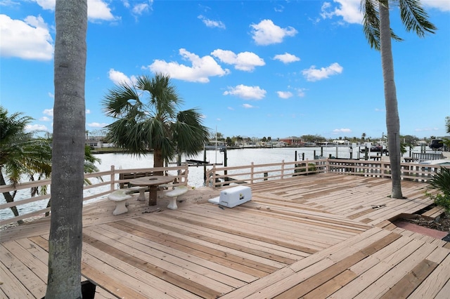 wooden terrace with a water view