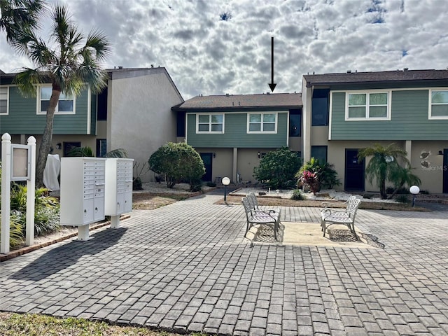 surrounding community featuring a mail area