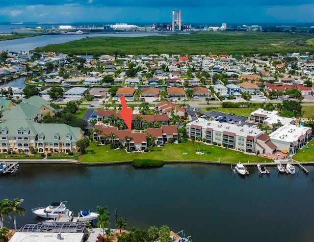 birds eye view of property featuring a water view