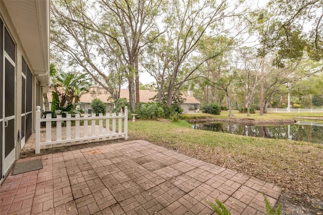 view of patio / terrace featuring a water view