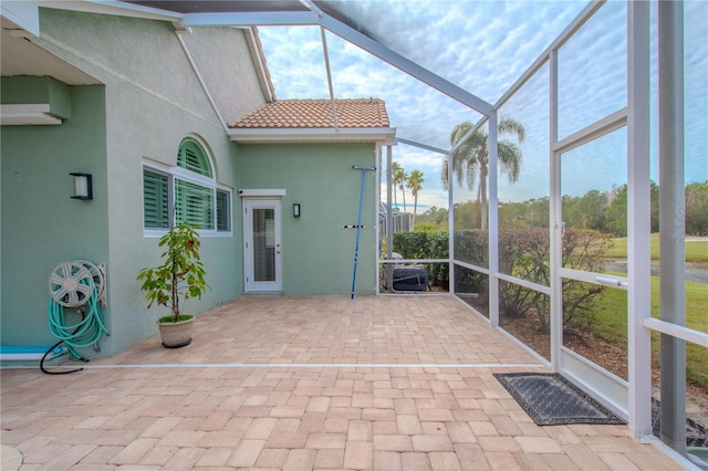 12113 Marblehead Dr, Tampa, FL 33626 - unfurnished sunroom with healthy amount of natural light