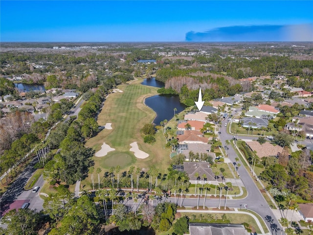 12113 Marblehead Dr, Tampa, FL 33626 - aerial overview of property's location with a nearby body of water, nearby suburban area, a local golf course, and a tree filled landscape