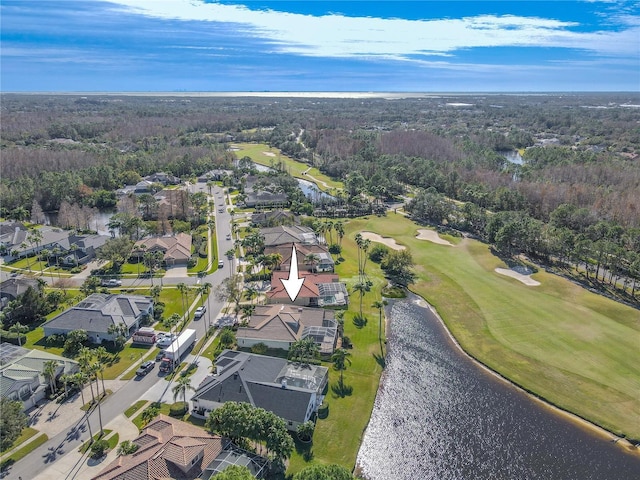 12113 Marblehead Dr, Tampa, FL 33626 - aerial view of property's location with a nearby body of water, a golf course, nearby suburban area, and a heavily wooded area
