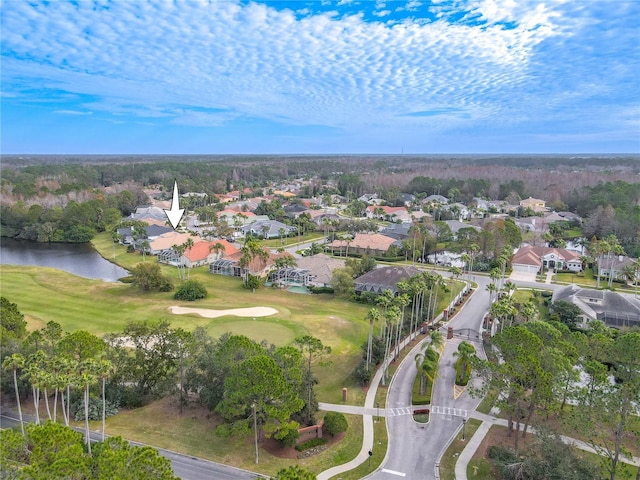12113 Marblehead Dr, Tampa, FL 33626 - aerial view of property and surrounding area featuring nearby suburban area, a golf course, and a large body of water