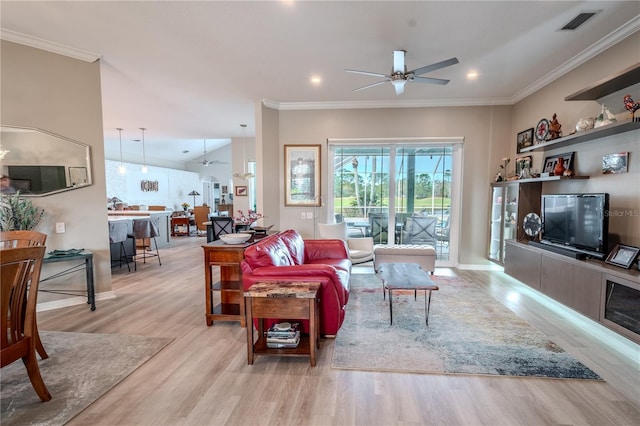 12113 Marblehead Dr, Tampa, FL 33626 - living area featuring wood finished floors, a ceiling fan, crown molding, recessed lighting, and baseboards