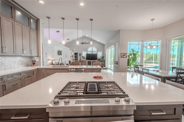12113 Marblehead Dr, Tampa, FL 33626 - kitchen with a sink, healthy amount of natural light, vaulted ceiling, recessed lighting, and open floor plan