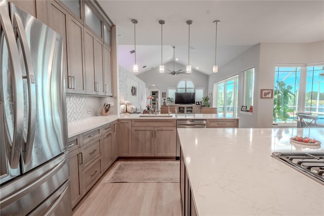12113 Marblehead Dr, Tampa, FL 33626 - kitchen featuring appliances with stainless steel finishes, a sink, a peninsula, glass insert cabinets, and ceiling fan