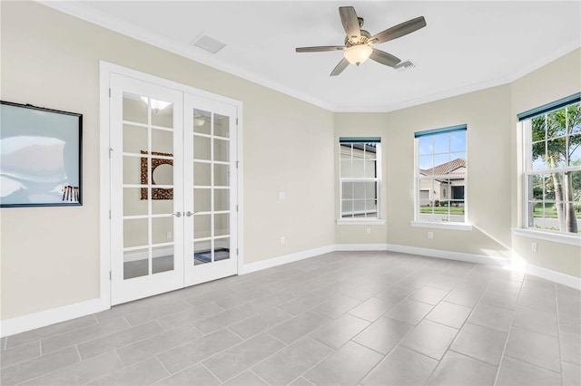 unfurnished room featuring ceiling fan, french doors, light tile patterned flooring, and crown molding