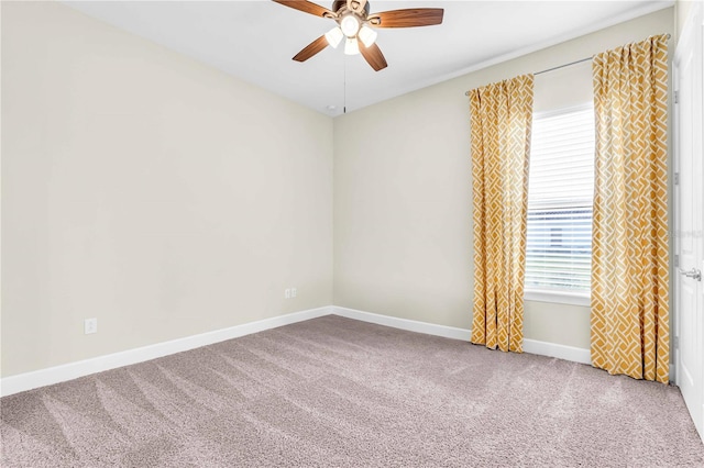 carpeted empty room with ceiling fan