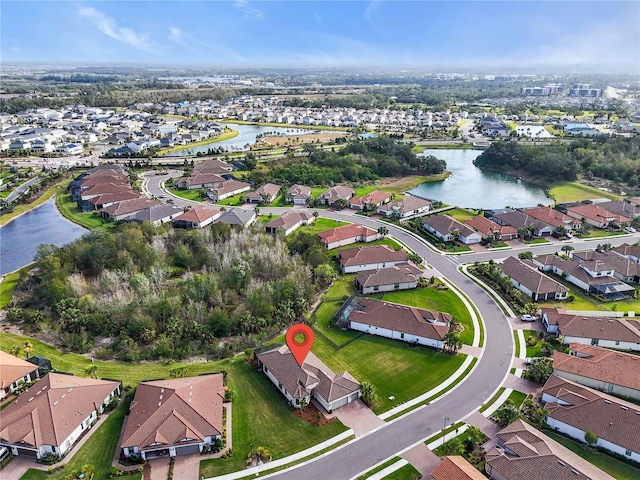 drone / aerial view featuring a water view