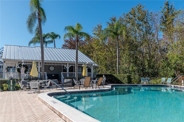 view of pool with a patio