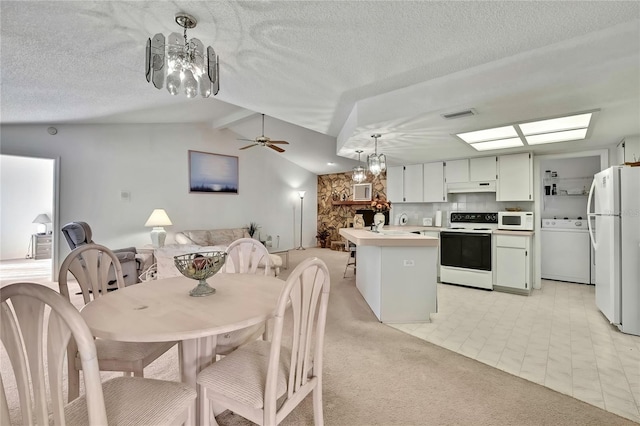10412 Ireland St, Spring Hill, FL 34608 - dining space with washer / dryer, vaulted ceiling with beams, a textured ceiling, and visible vents