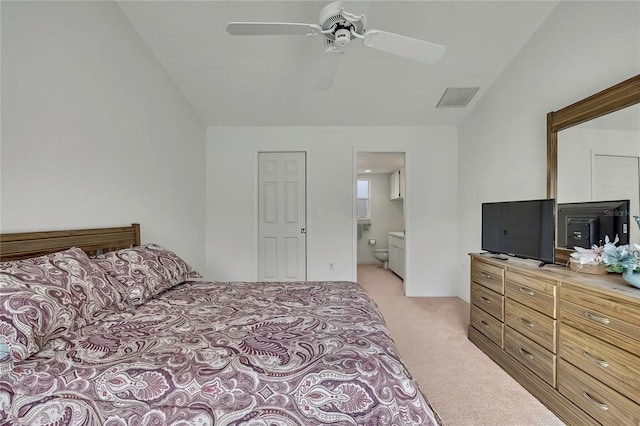 10412 Ireland St, Spring Hill, FL 34608 - bedroom featuring ensuite bathroom, visible vents, a ceiling fan, light carpet, and lofted ceiling