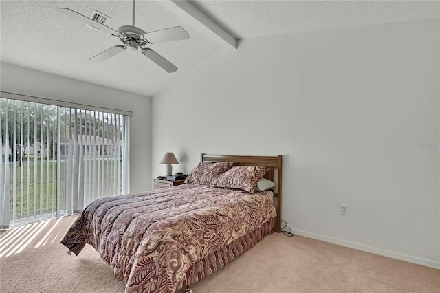 10412 Ireland St, Spring Hill, FL 34608 - carpeted bedroom with baseboards, access to outside, vaulted ceiling with beams, and a textured ceiling