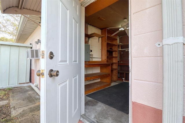 pantry featuring an AC wall unit