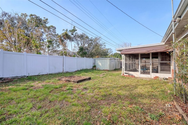 view of yard with a sunroom